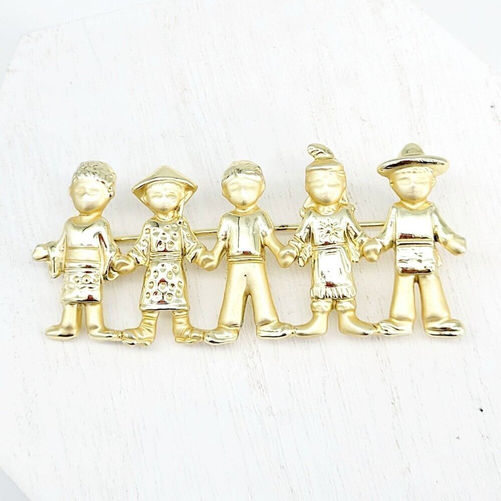 AJC American Jewelry Co. Children Of The World Brooch Satin & Polished Gold Tone